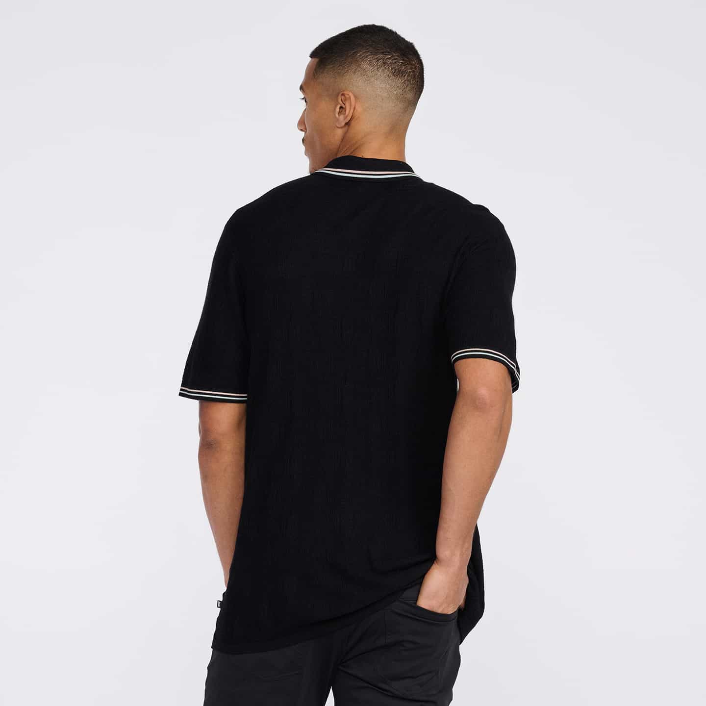 Polo Tricoté En Jacquard Multilogo