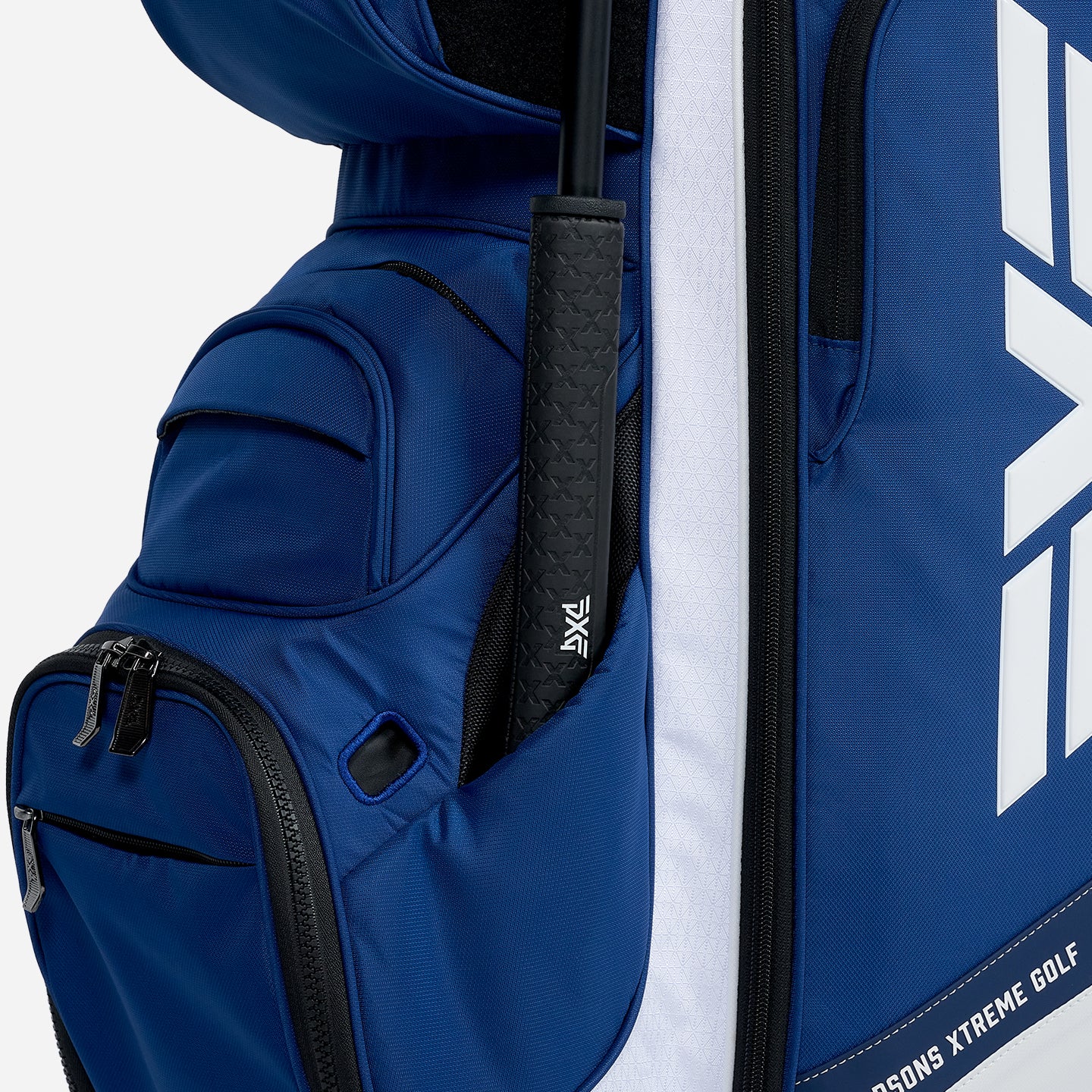 PXG navy and white PXG xtreme cart golf bag on a white background